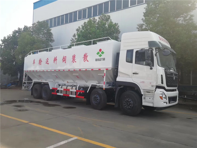 東風(fēng)天錦20方散裝飼料運(yùn)輸車可用來運(yùn)輸某些無腐蝕性粉粒狀原料